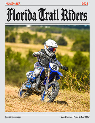 Cover of 'Florida Trail Riders' magazine featuring a dirt bike rider on a trail. November 2025 Issue.